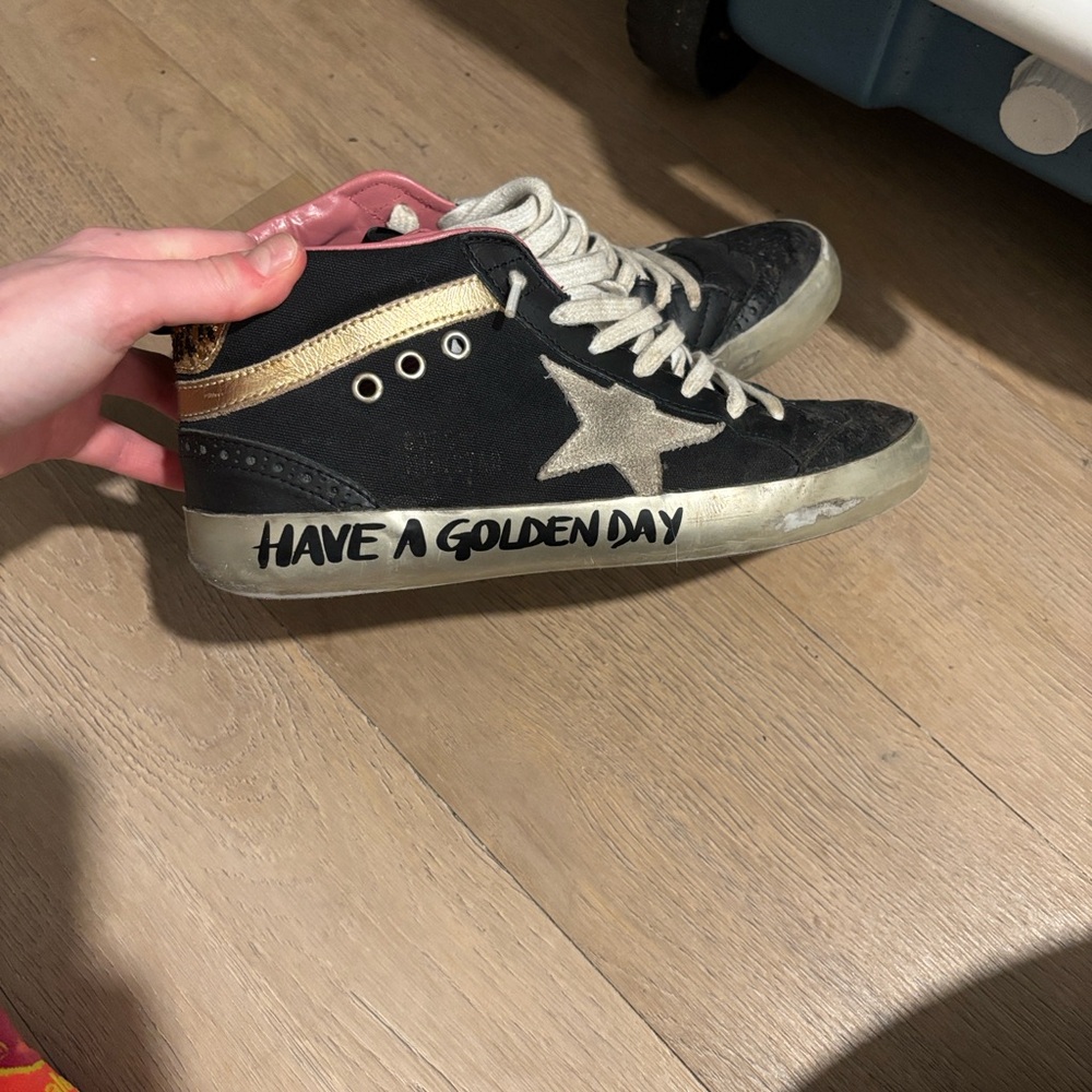 Golden Goose Black and Gold Star Sneakers